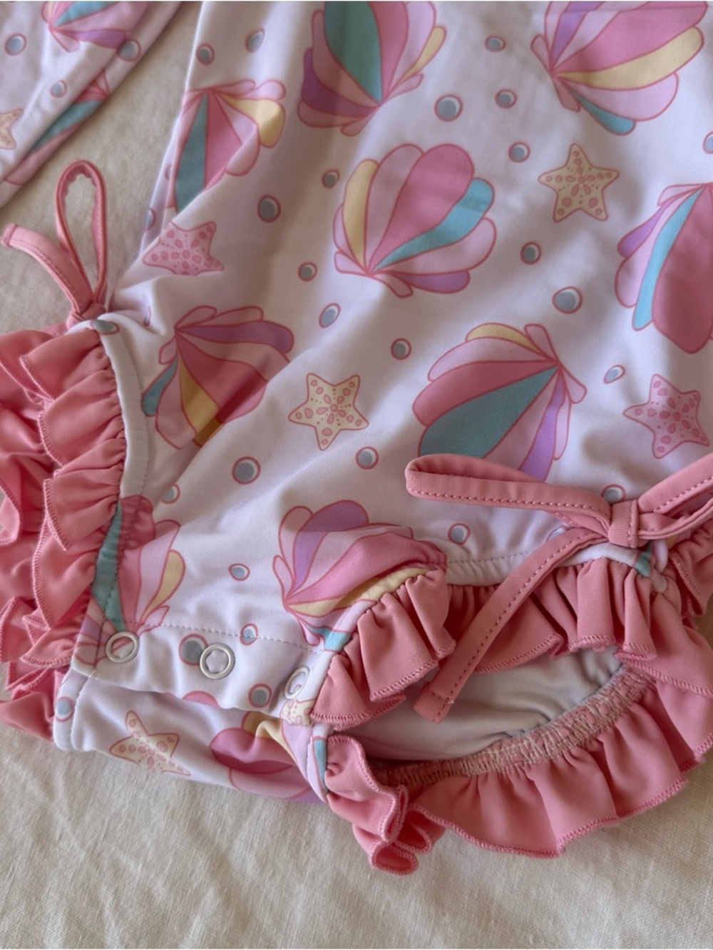Caden Lane Long Sleeve Rash Guard Ruffle Bottom Swimsuit Seashell Print - Picture 2 of 4